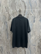 Black short-sleeve T-shirt on hanger, plain back view