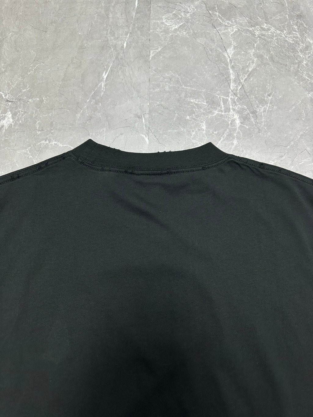 Black short-sleeve T-shirt back neckline with crew collar