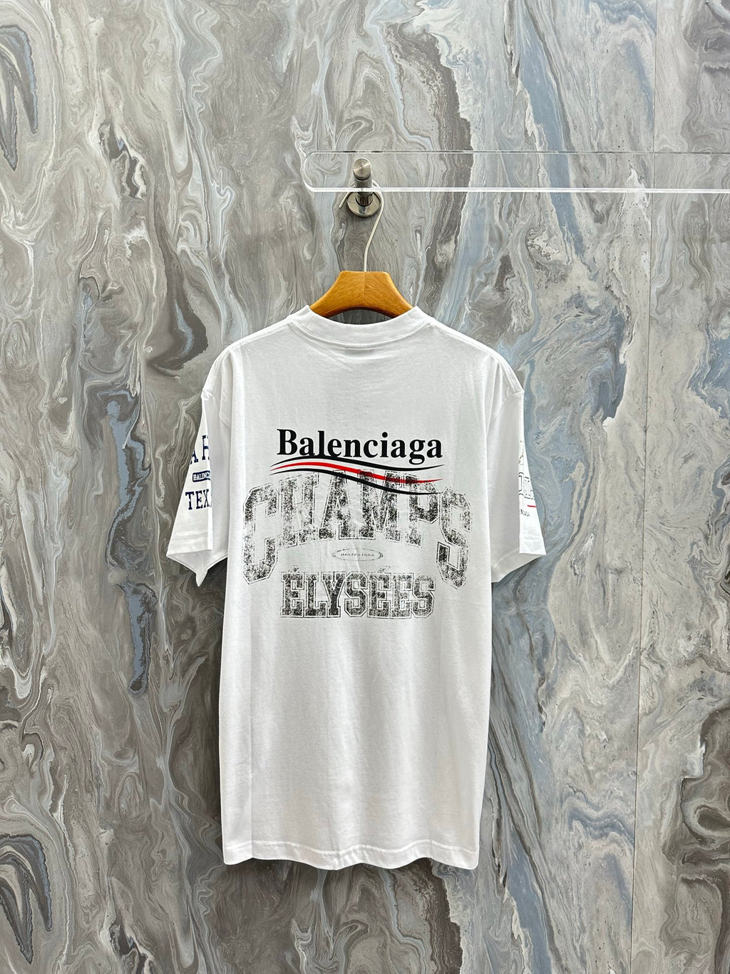 Balenciaga white short-sleeve T-shirt back with Balenciaga wordmark and distressed text