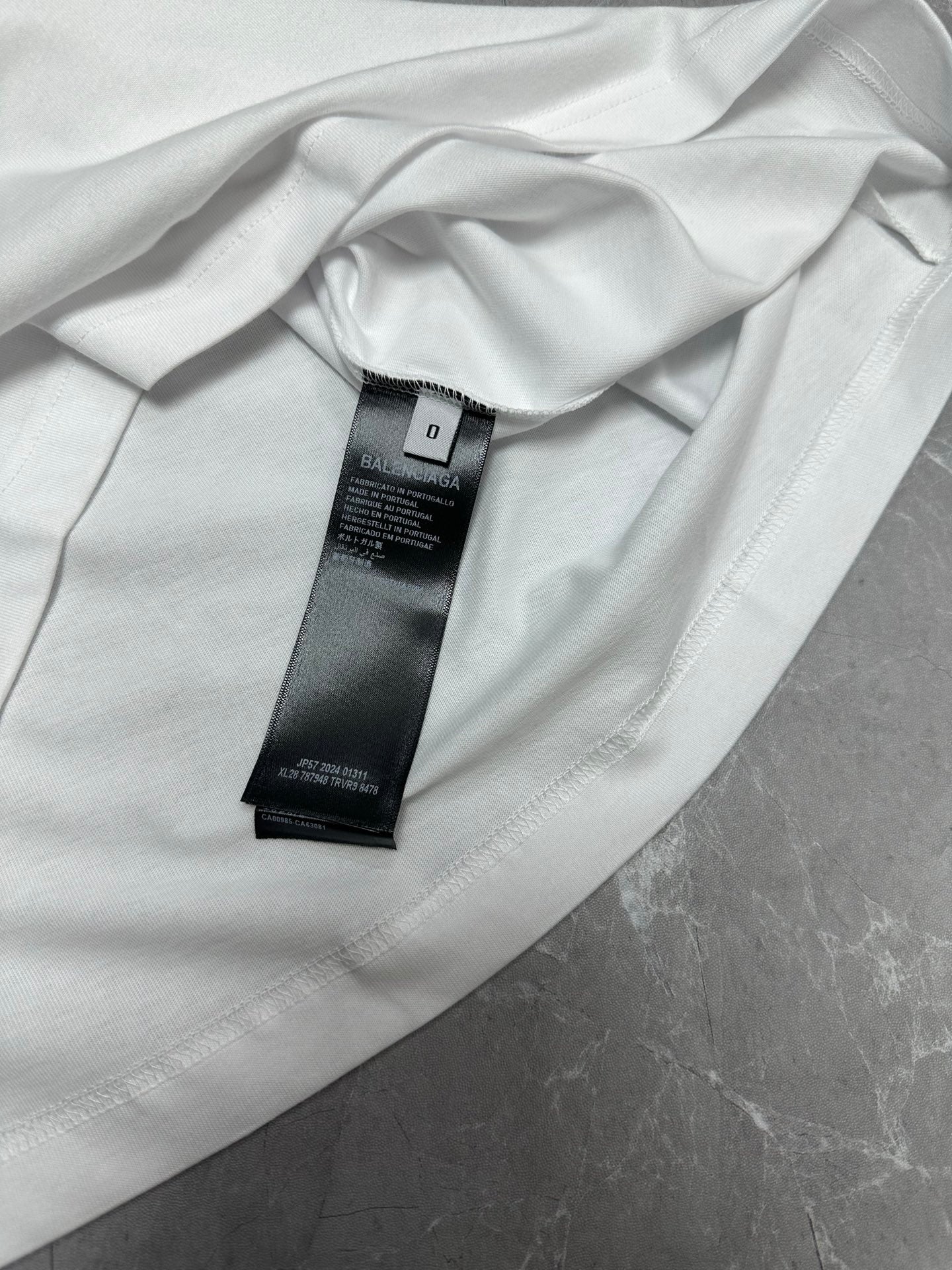 Balenciaga white short-sleeve T-shirt, neckline and care label tag detail
