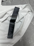 Balenciaga white short-sleeve T-shirt, care label tag detail near collar