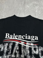 Black short-sleeve T-shirt with large Balenciaga text and red striped graphic.
