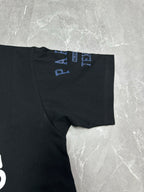 Black short-sleeve T-shirt with blue logo text on sleeve cuff.