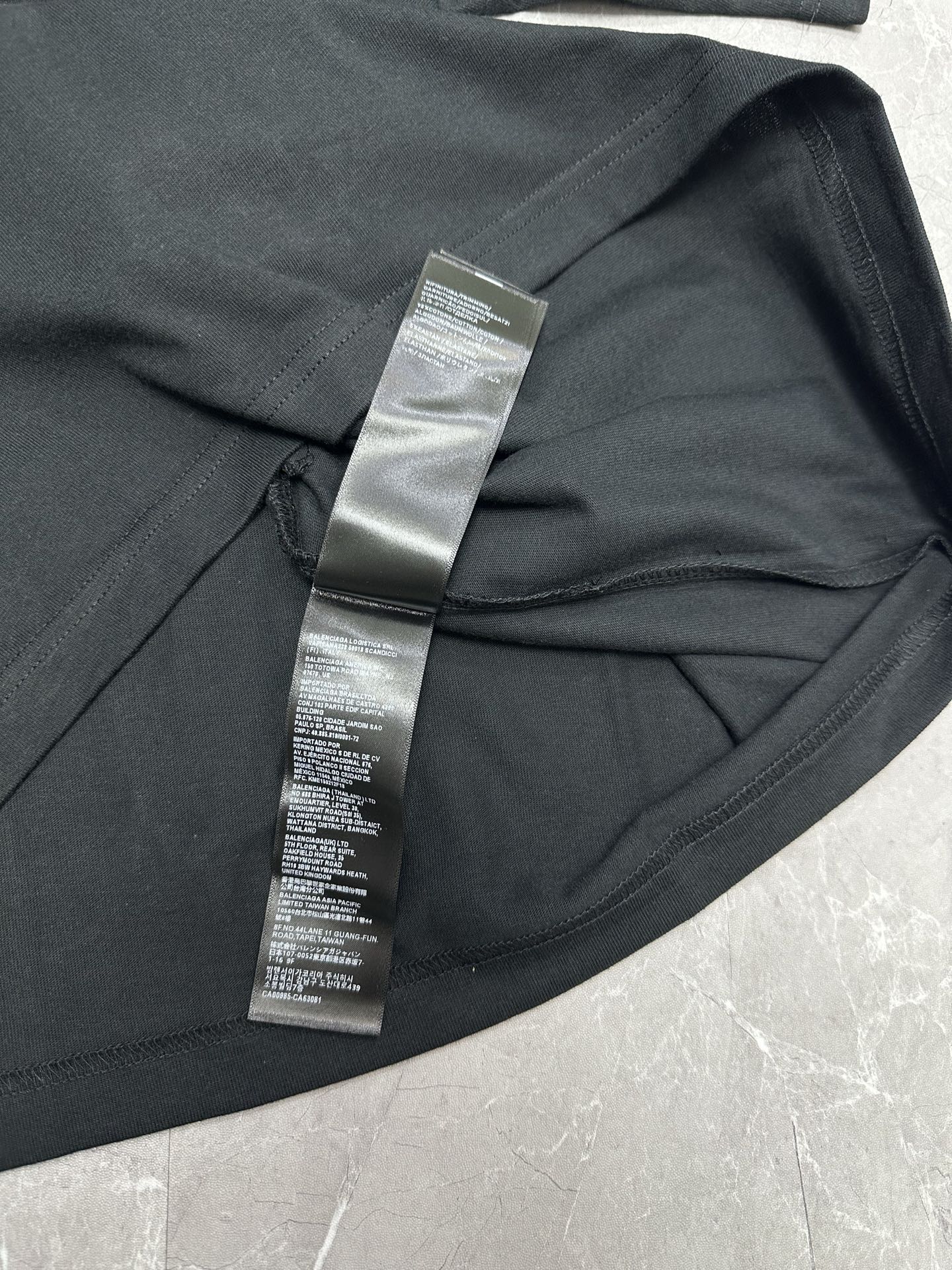 Balenciaga short-sleeve T-shirt, black, interior neck tag detail near collar