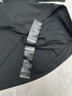 Balenciaga short-sleeve T-shirt, black, close-up of neck label and seam