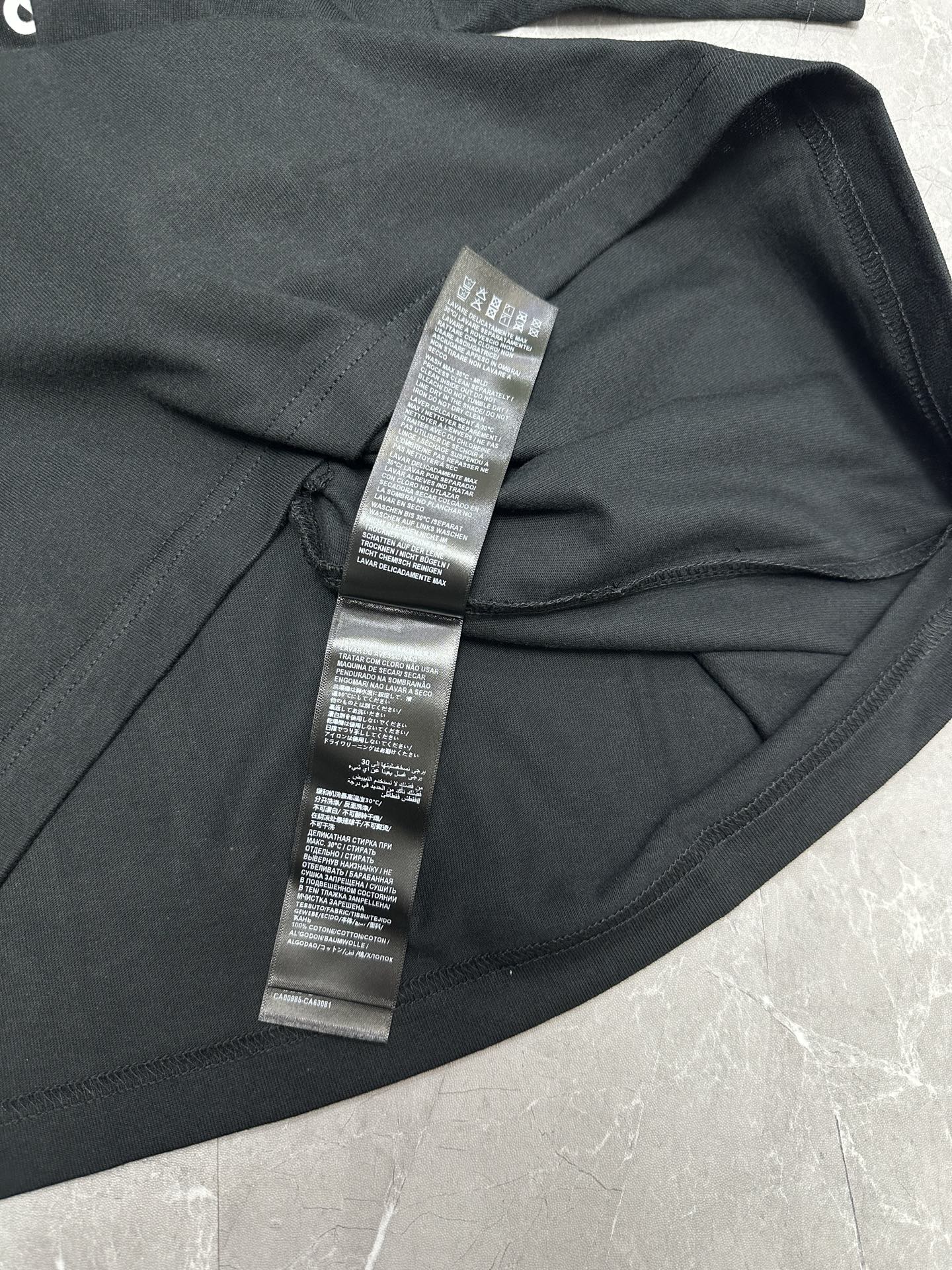 Balenciaga short-sleeve T-shirt, black, close-up of neck label and seam