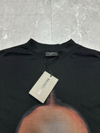 Balenciaga black T-shirt neckline close-up with white size tag