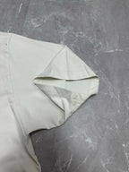 White T-shirt draped showing short sleeve and folded shoulder detail