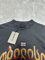 Dark charcoal graphic T-shirt neckline and front print with hanging price tag