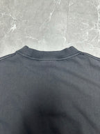 Dark charcoal T-shirt back view with crew neck and clean shoulder seam