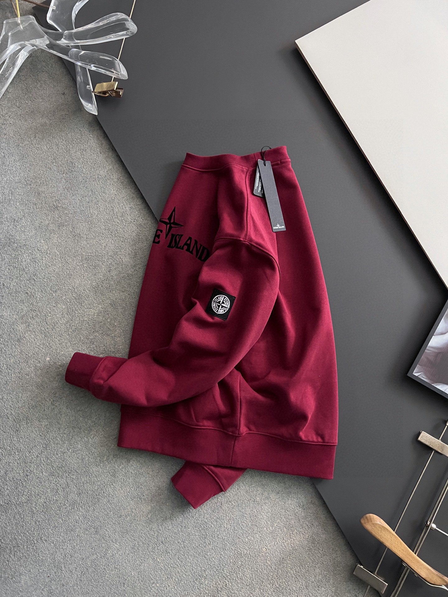 Stone Island maroon tracksuit pants with side logo emblem and waistband tag