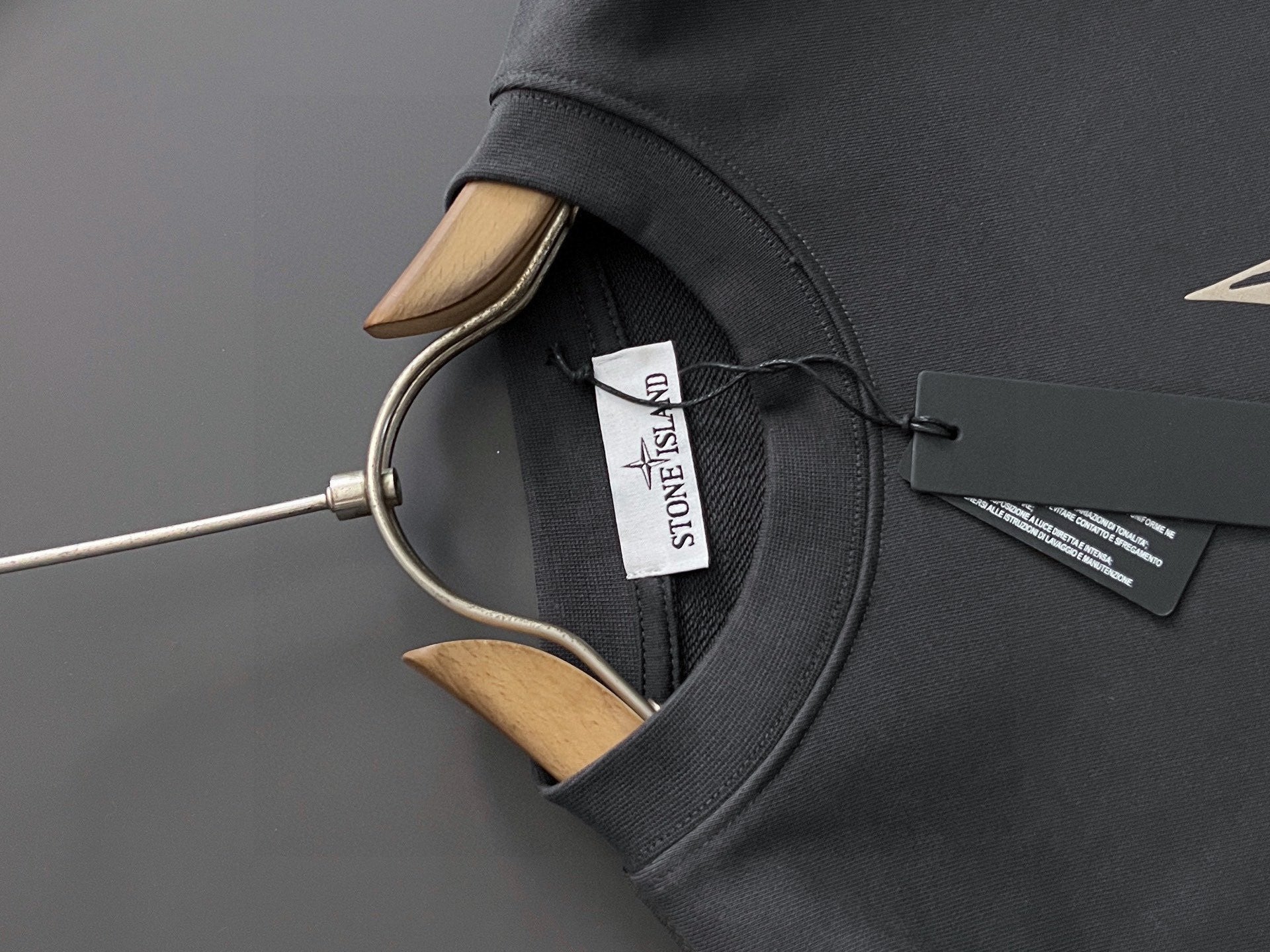 Stone Island sweatshirt neck and label, black ribbed collar and inner tag