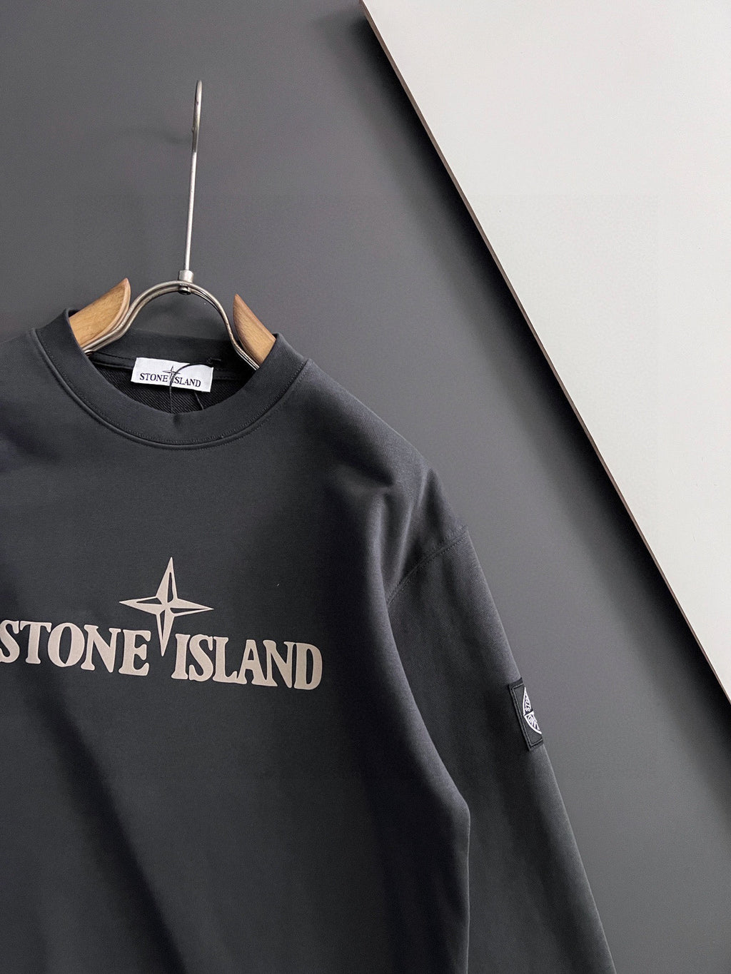 Stone Island sweatshirt, black crewneck with front logo and sleeve detail