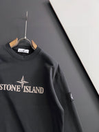 Stone Island sweatshirt, black crewneck with front logo and sleeve detail