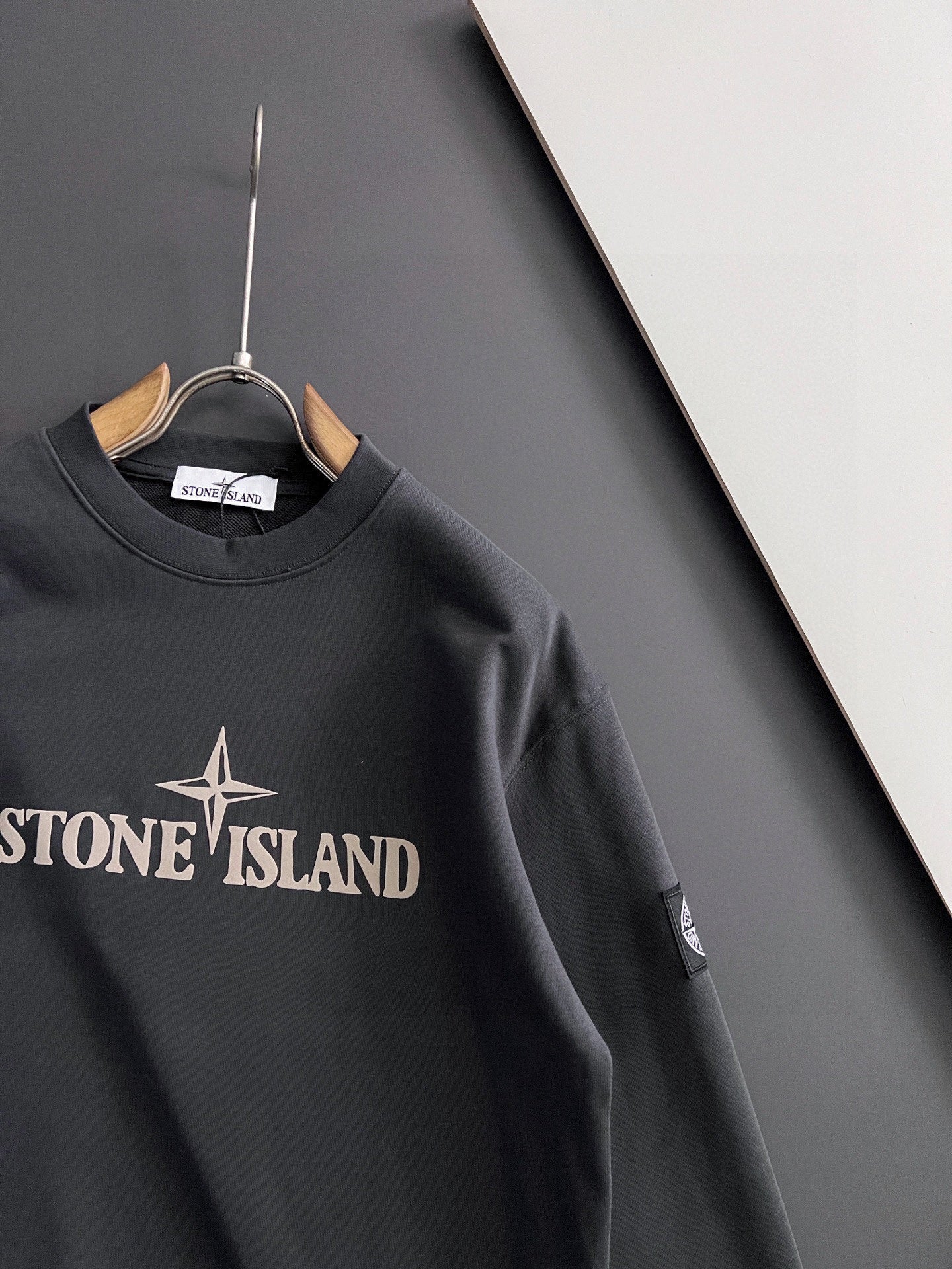 Stone Island sweatshirt, black crewneck with front logo and sleeve detail