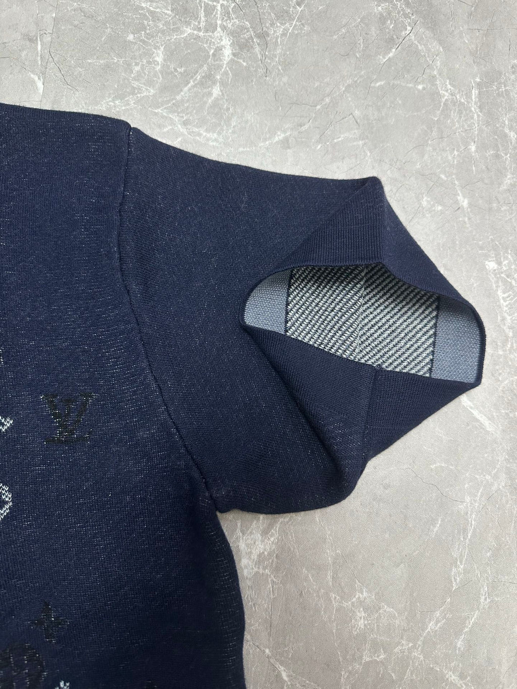 Louis Vuitton navy T-shirt showing striped inner neck lining and ribbed collar