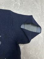 Louis Vuitton navy T-shirt showing striped inner neck lining and ribbed collar