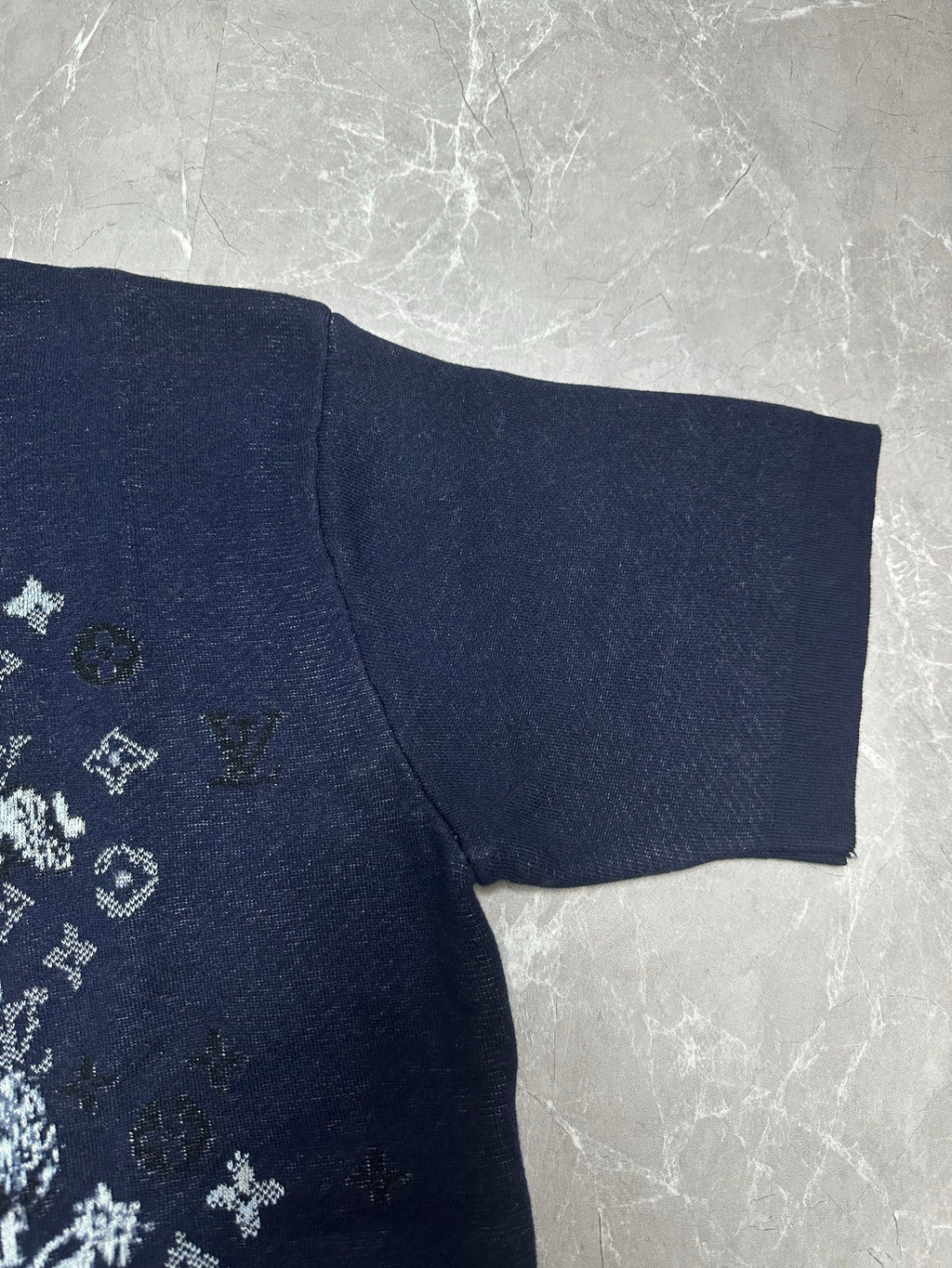 Louis Vuitton navy short-sleeve T-shirt with visible side seam and textured knit hem