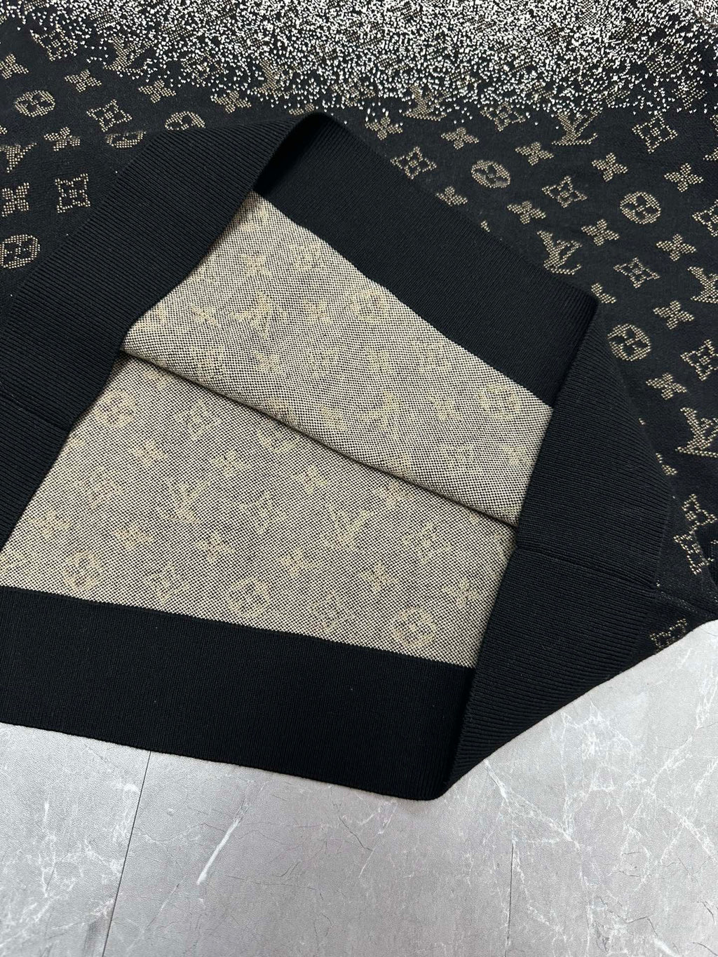 Folded monogram sweater with contrasting knit panels in dark navy and beige