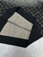 Folded monogram sweater with contrasting knit panels in dark navy and beige