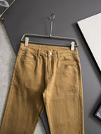 Olive Dior jeans on hanger, straight legs and stitched waistband
