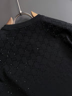 Black Gucci top back panel close-up with textured allover dotted pattern