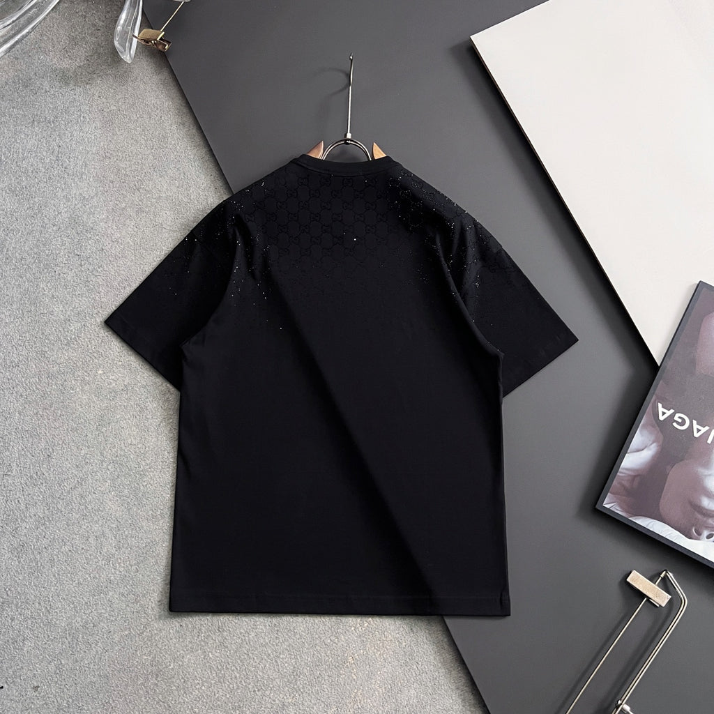 Black Gucci short-sleeve top back view on hanger with smooth fall