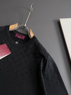 Black Gucci short-sleeve top on hanger with allover dotted geometric motif