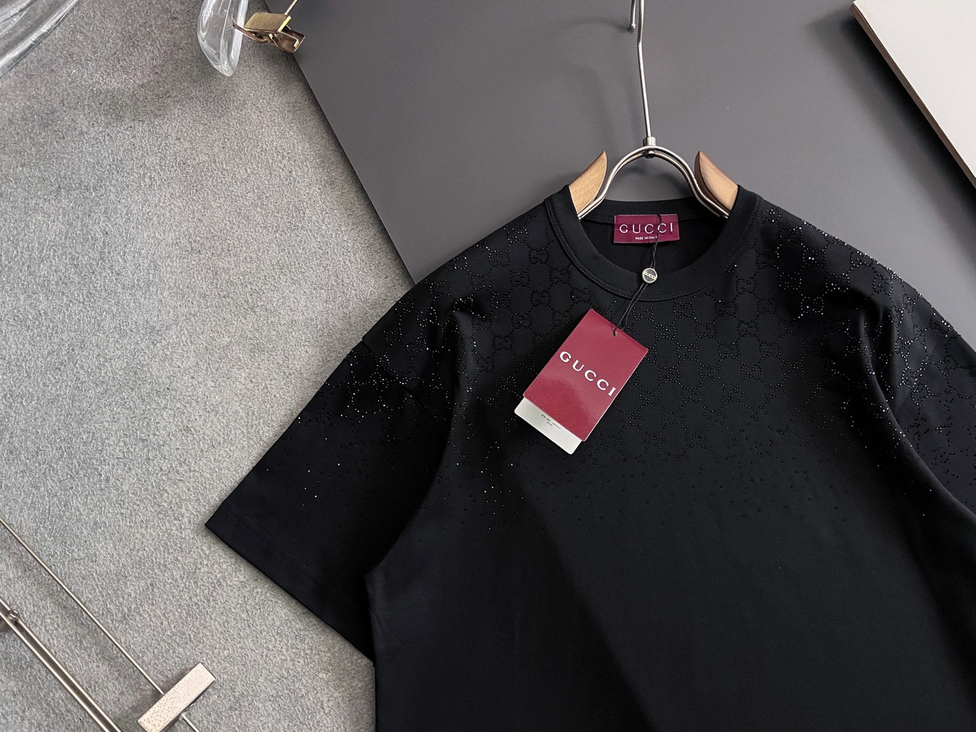 Black Gucci short-sleeve top with crew neck and allover subtle geometric print