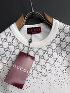 Gucci crew-neck T-shirt, white GG monogram pattern, maroon brand tag