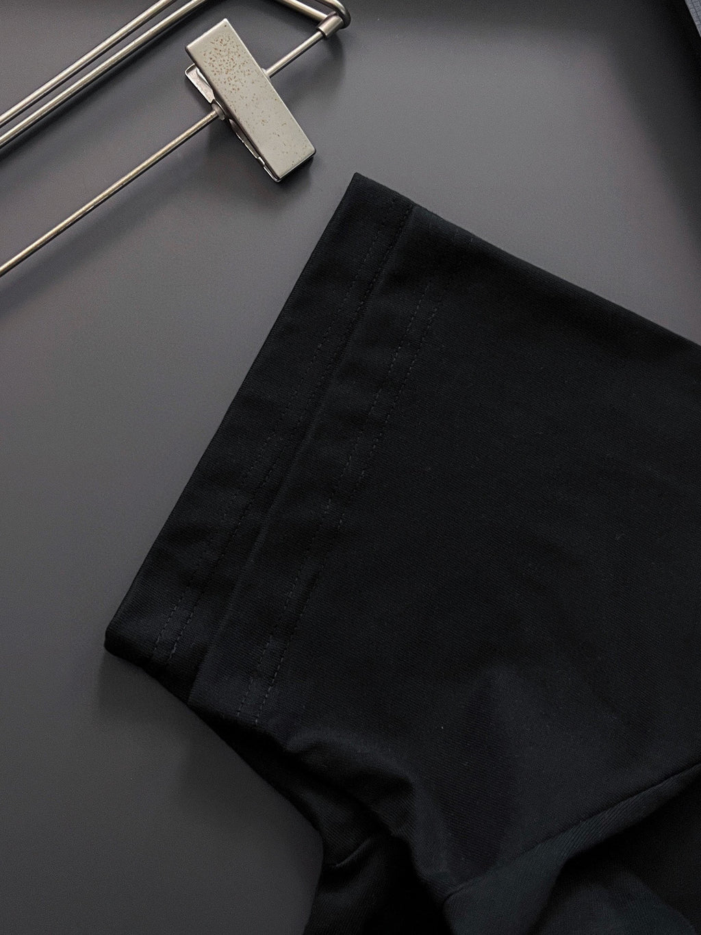 Black shorts with stitched waistband and small side seam detail