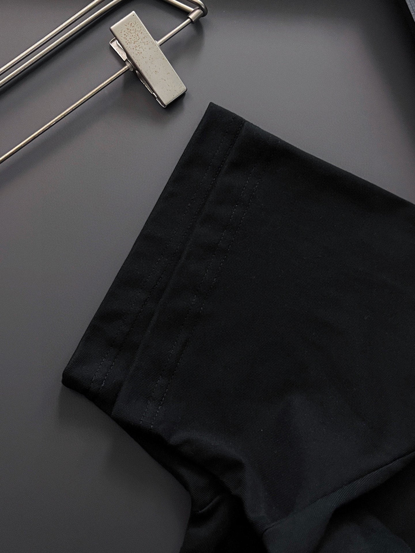 Black shorts with stitched waistband and small side seam detail