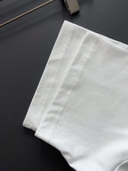 White T-shirt hem with stitched side seam