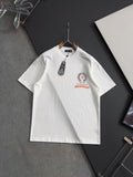 White short-sleeve T-shirt with front crest graphic and red accent print