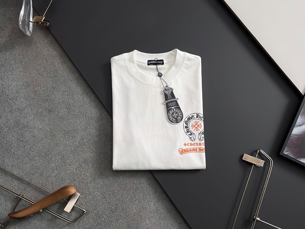 White short-sleeve T-shirt on hanger with front crest graphic and tag