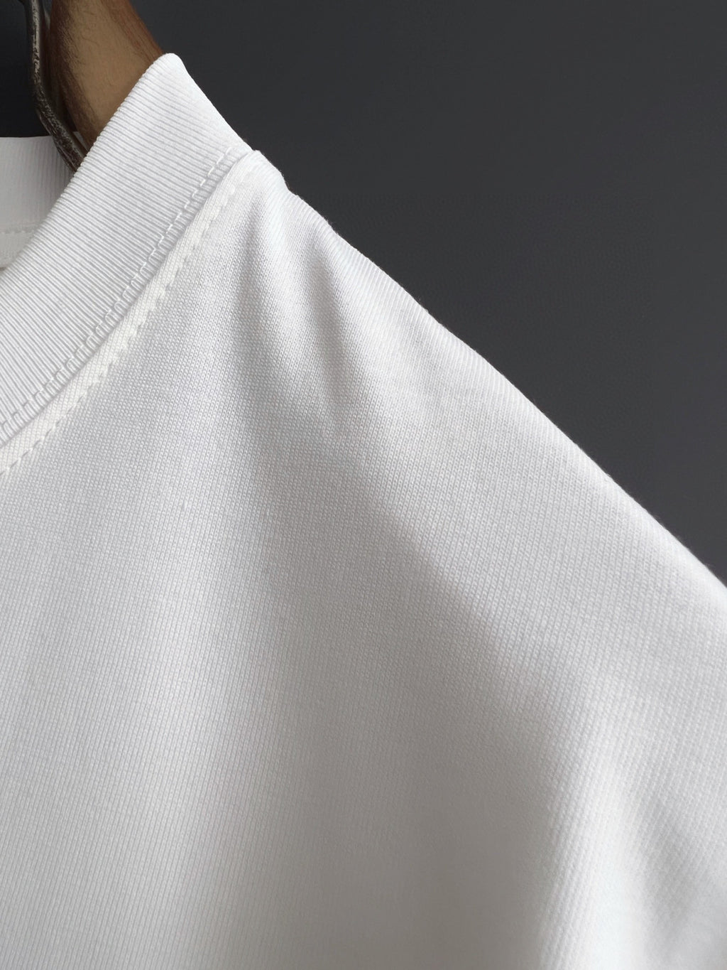 White T-shirt shoulder and sleeve seam detail