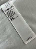 White fabric care label with BALENCIAGA and product material details