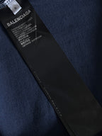 Navy T-shirt with black interior care label and stitched side hem