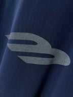Navy T-shirt with large grey graphic detail on the chest