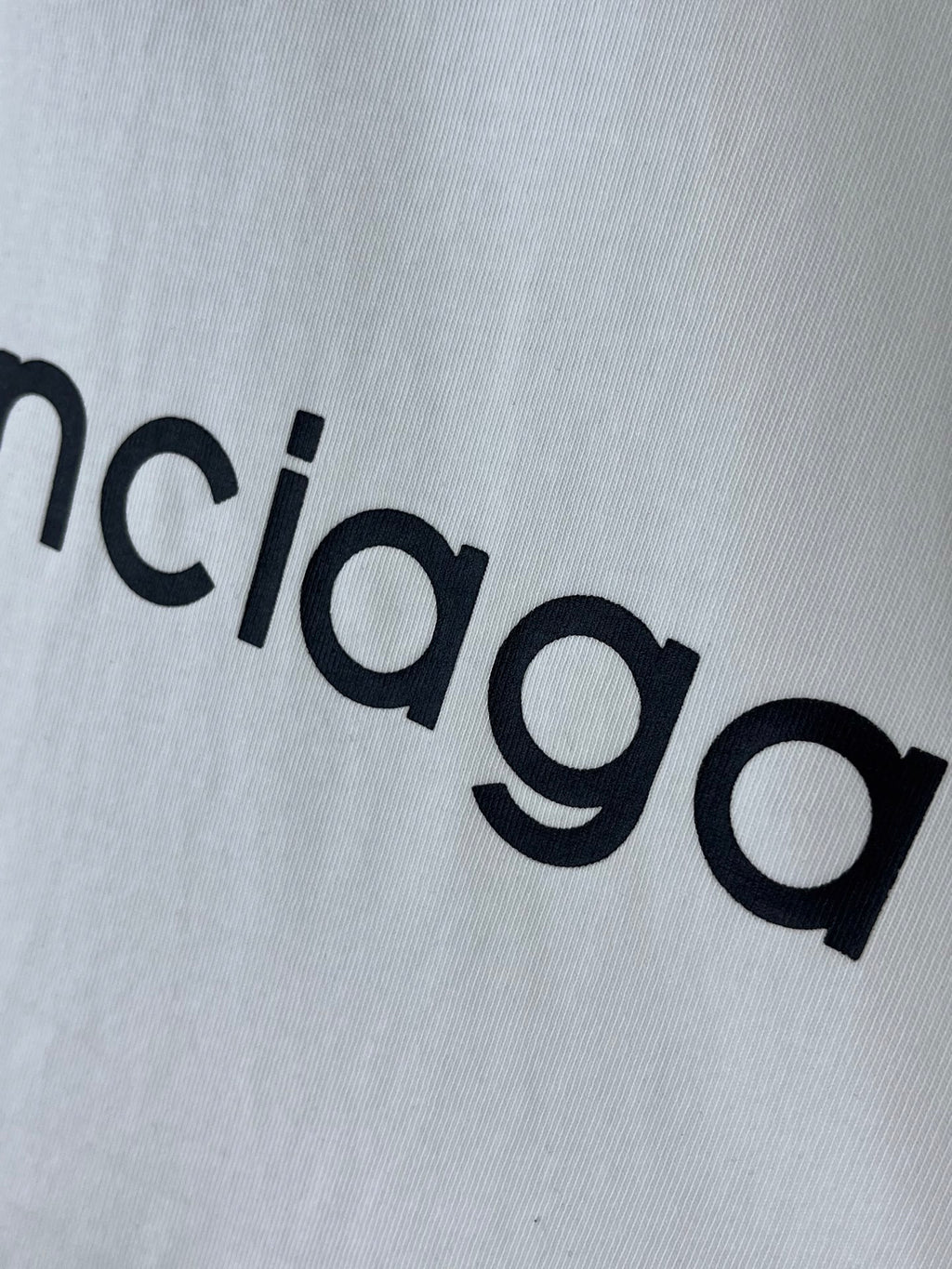 White T-shirt with Balenciaga wordmark print in black letters