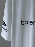 White T-shirt with partial Balenciaga logo print on hem, short sleeves