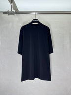 Black short-sleeve T-shirt on hanger, minimal front design