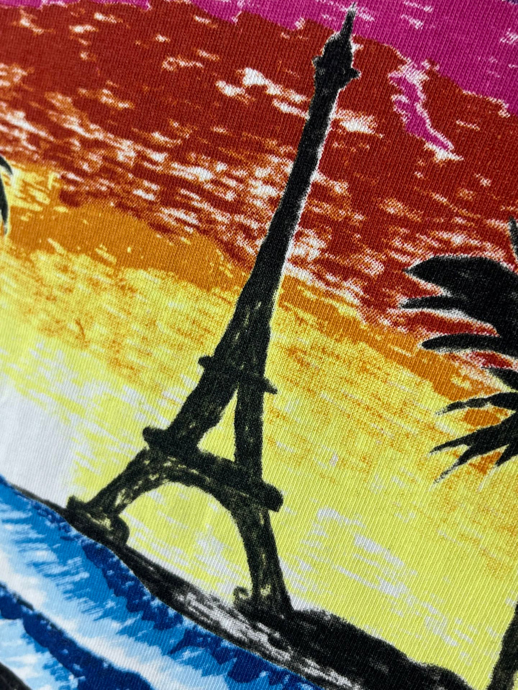 Balenciaga T-shirt graphic close-up: tall pole silhouette and sunset palette