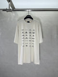 White short-sleeve T-shirt with all-over Balenciaga logo and icon print on front