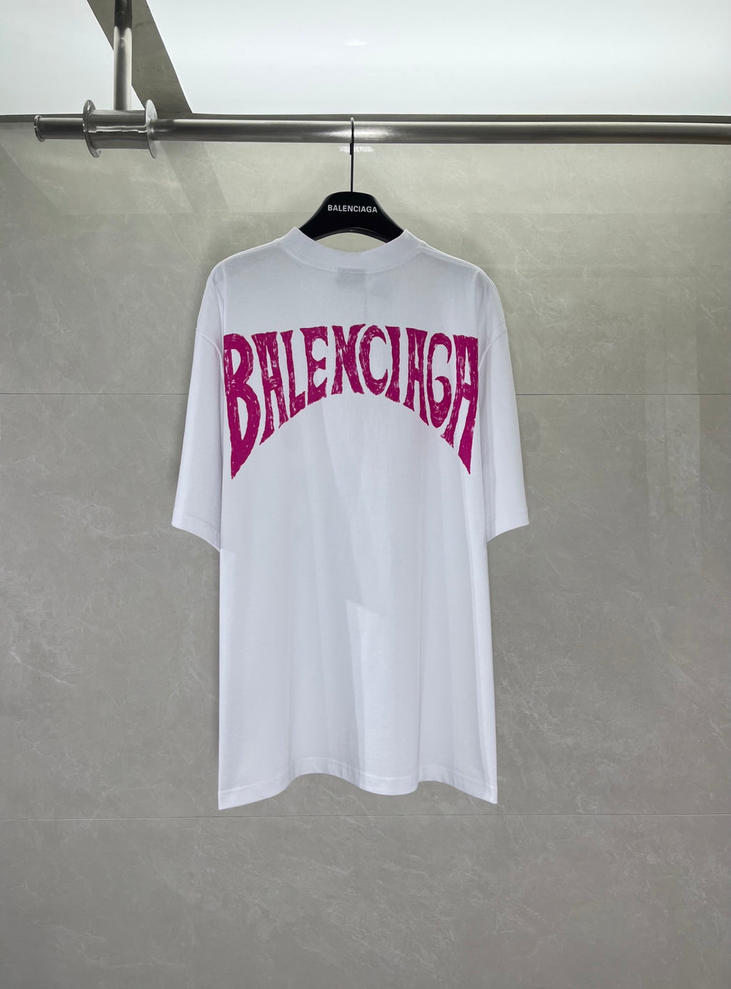 Balenciaga white T-shirt with magenta “BRAZIL” lettering and landscape graphic