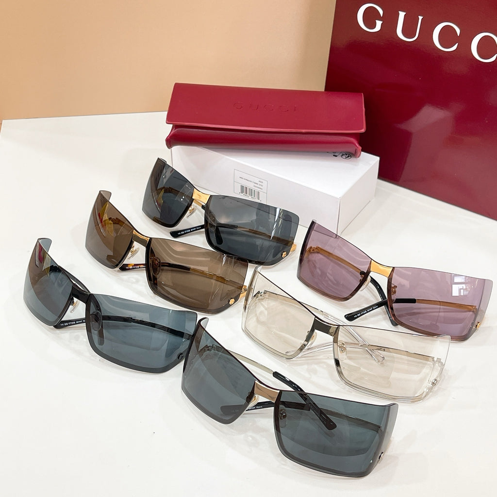 Gucci glasses set with multiple lens tints: blue, brown, and clear, black frames