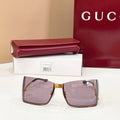 Gucci square sunglasses with gold frame, tinted mauve lenses, dark temples