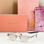 MiuMiu cat-eye glasses, clear lenses with gold frame and blue-tipped temples