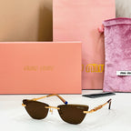 MiuMiu cat-eye sunglasses, gold frames and blue-tipped temples, dark-brown lenses