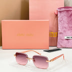 Sunglasses with pink tinted lenses and gold metal frame and temples
